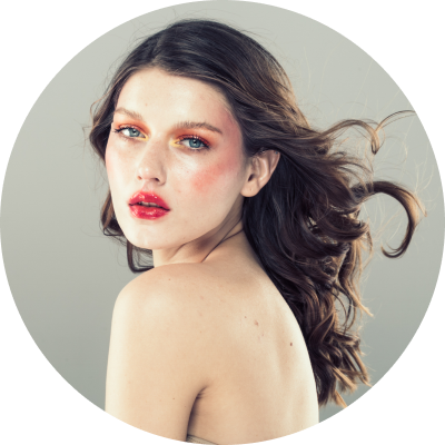 a women with long hair and red lipstick | Dimethicone Supplier