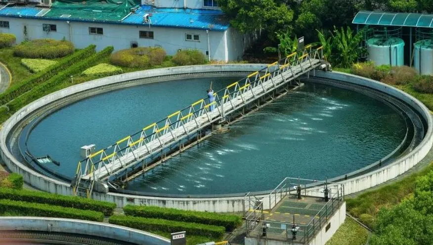 Industrial wastewater treatment process where defoamers are applied